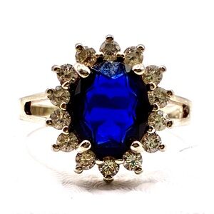 VTG Signed JC Oval Cut Cubic Zirconia Sapphire with Halo of CZ’s In Silver Tone